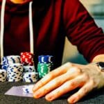 How to Stack the Odds In Your Favor with Rapid Decision-Making - Man at Poker Table with Chips